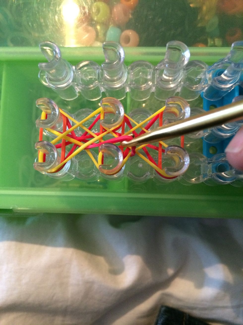 Pull it over the peg.