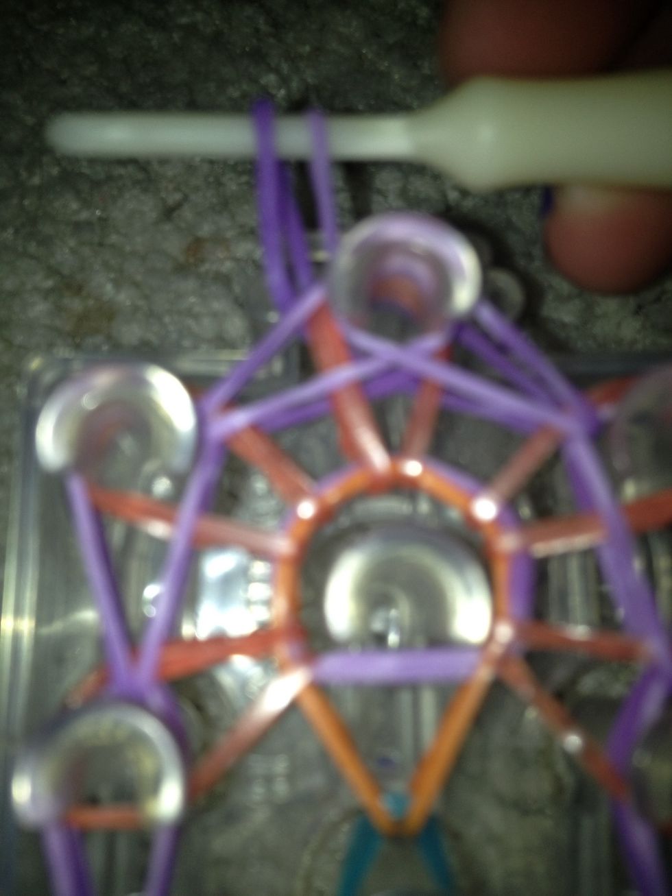 Pull it through ad out the other side of the hook