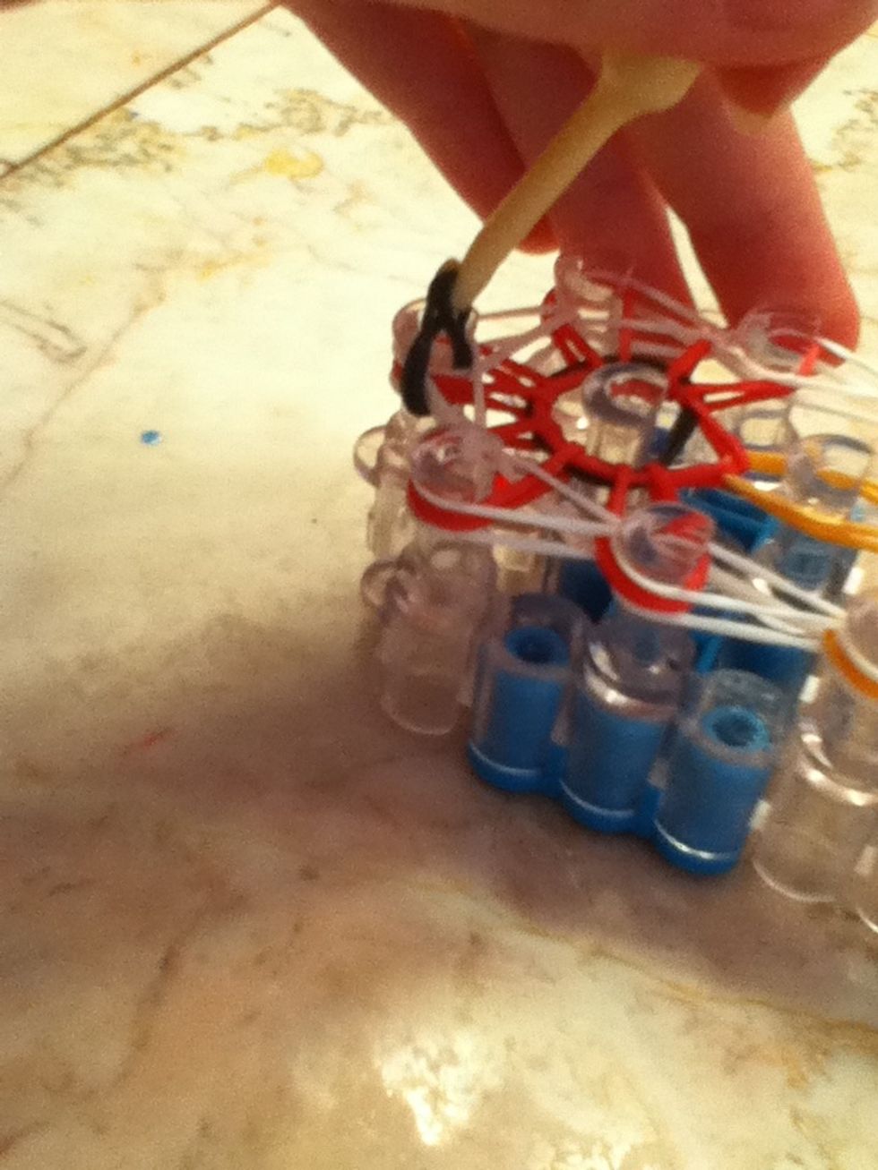 Pull it through the bands and you will have a double "o" on your hook