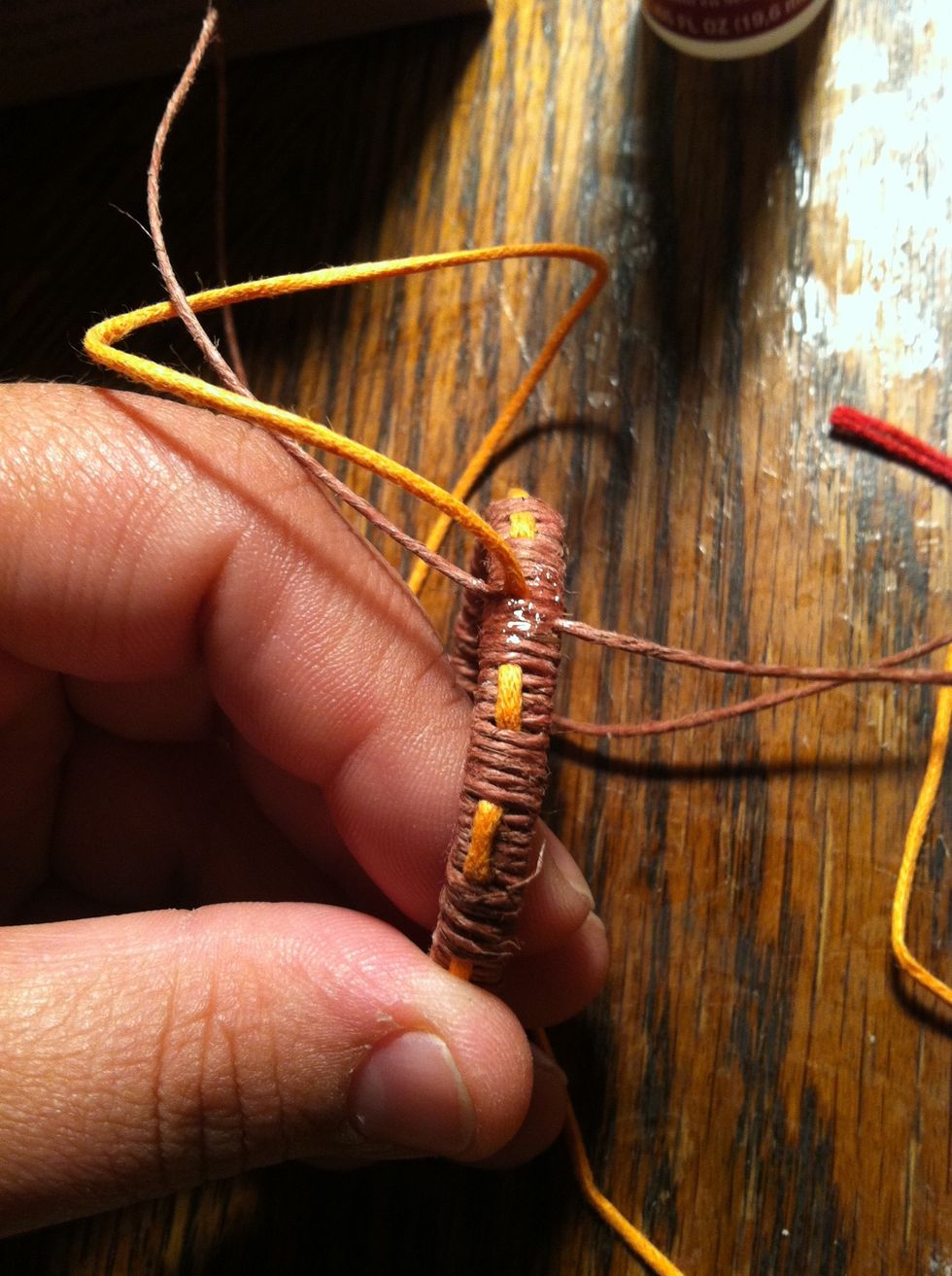 Pull it tight. Add a dab of glue and let dry for a moment. Now it's time to creat your necklace. At this point you can decide what kind of necklace you want.