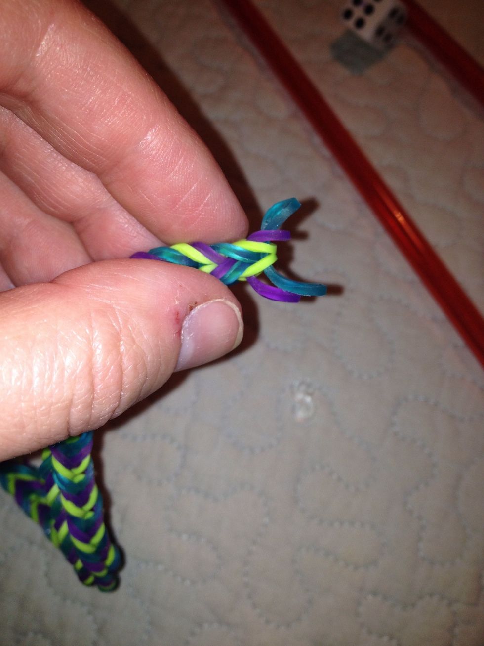 Pull last two elastics off straws. You can see blue/teal is only through purple on one side.