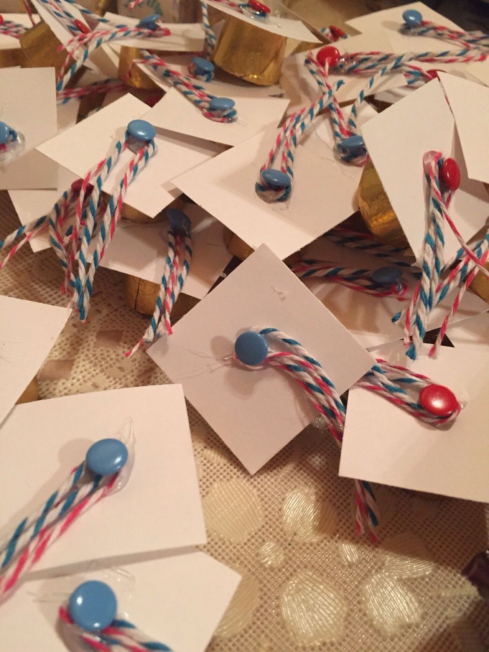 Pull off any little strands of the dried hot glue.