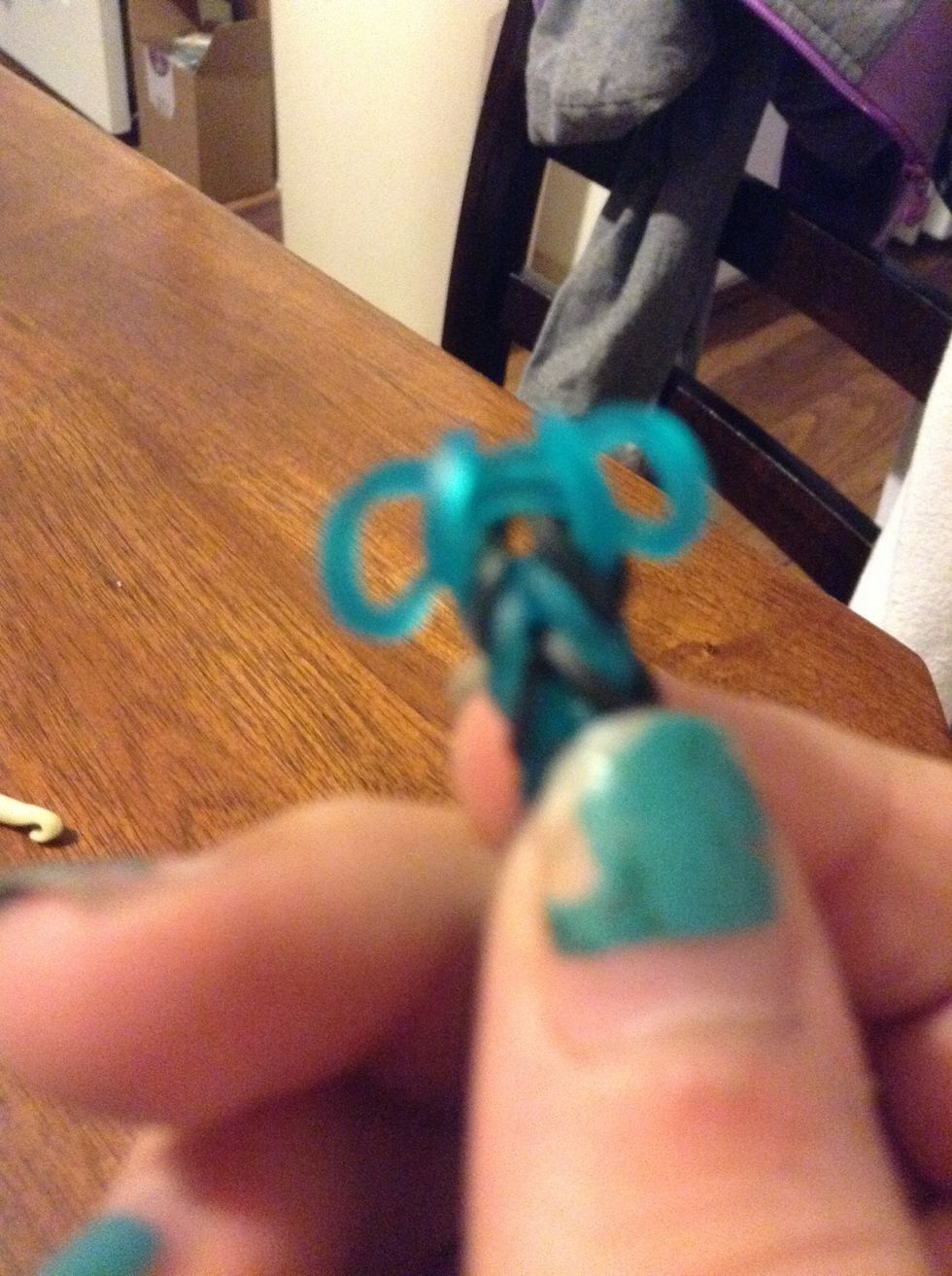 Pull off the bottom band (mine was black)