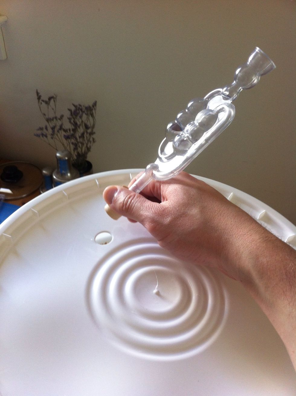 pull off the rubber stop and airlock from the primary to let air into it so when you turn the spout on it will flow beautifully.