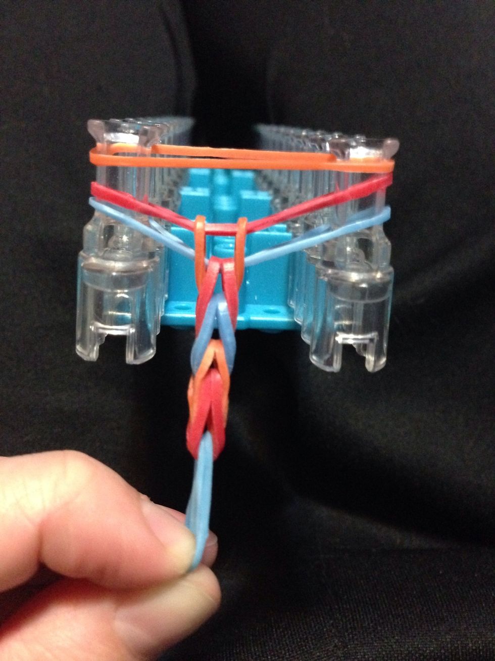 Pull on the "soon to be bracelet" every couple times you do it