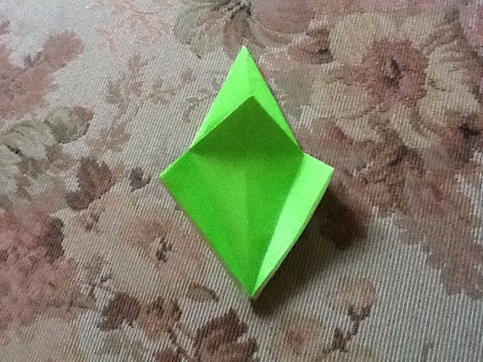 Pull out folded flaps.