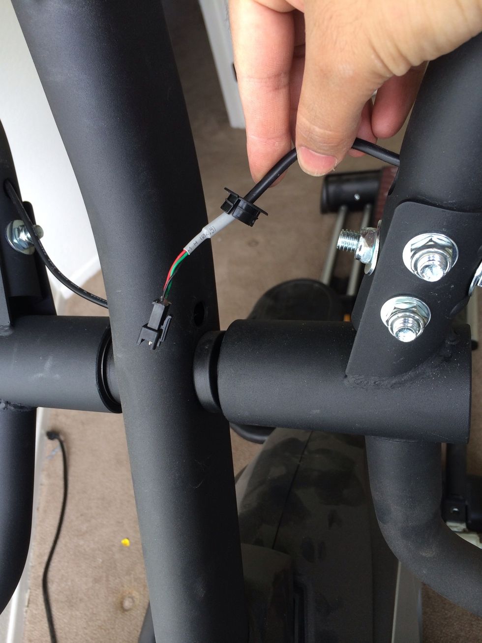 Pull out rubber stopper to carefully detach electrical component.