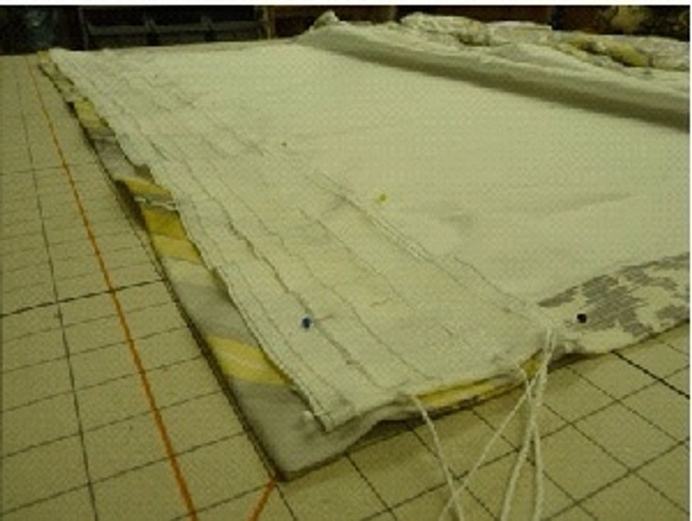 Pull out shirring cords and pin the tape to the drapery.