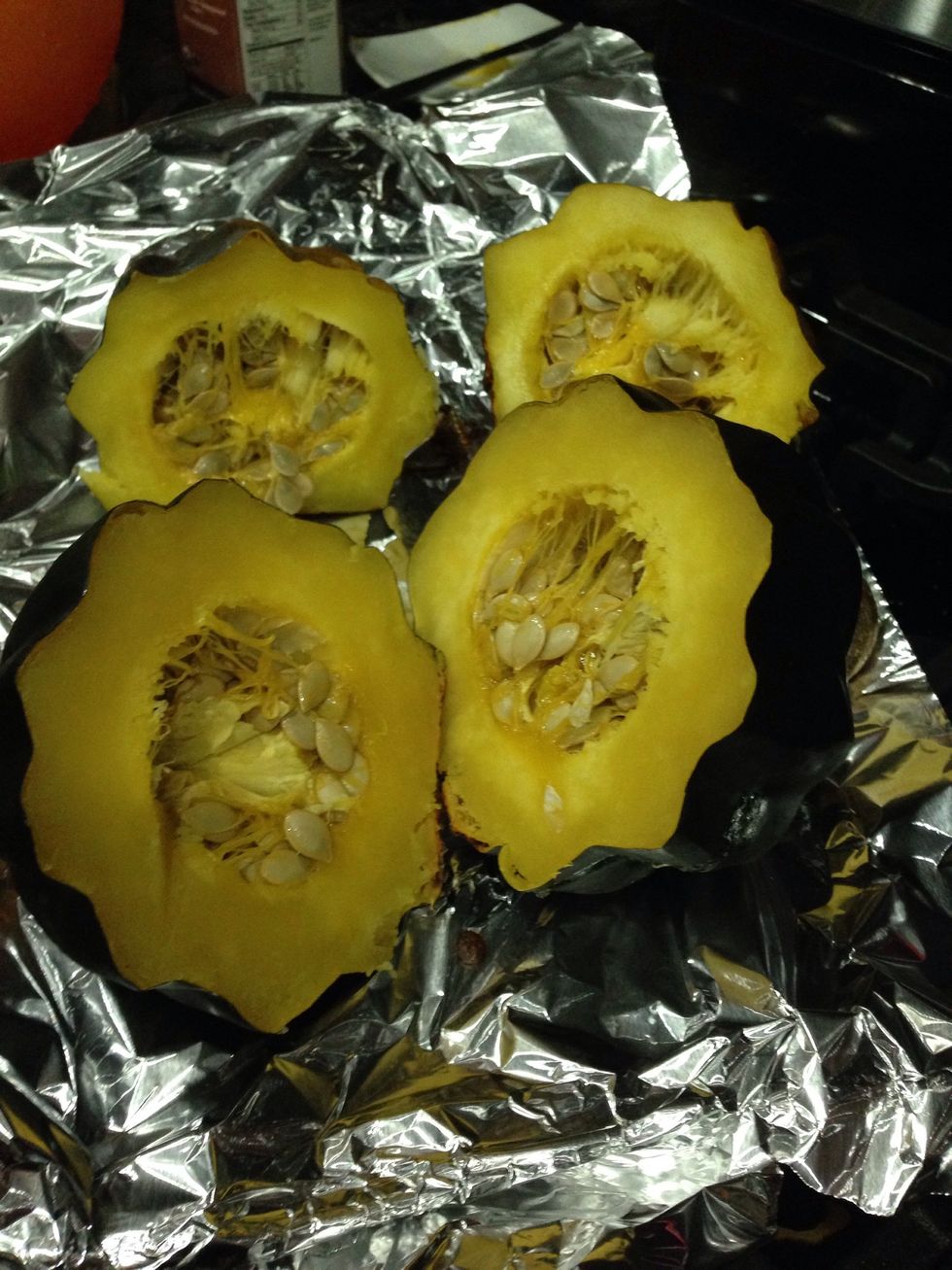 Pull-out when very soft to the touch. Squash will be VERY hot. (I recommend wearing gloves from this point on.) Cut squash in half.