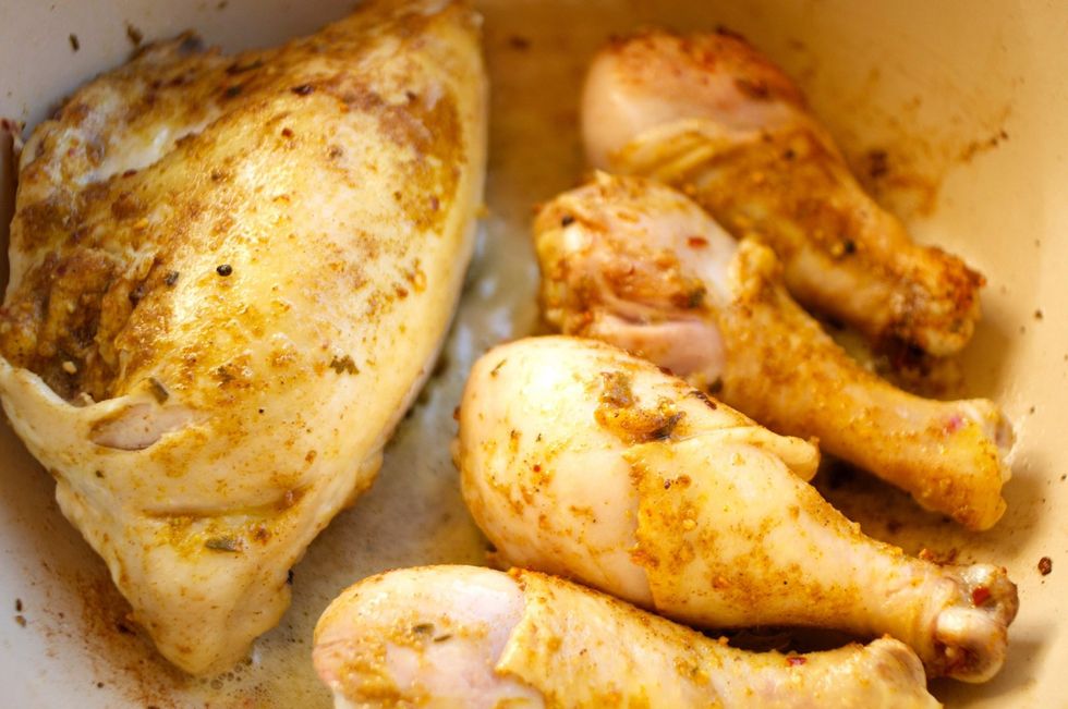 Pull out your dutch oven or large cooking pan and place over high heat. Add the coconut oil and wait for it to be nice and hot. You want to hear the chicken sizzle when you put it in. Brown all sides.