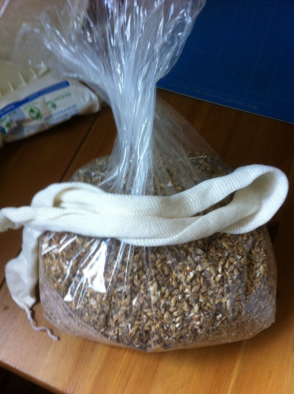 pull out your sack of cracked grains. you can get this for your local brew craft store. also grab your cheese cloth.
