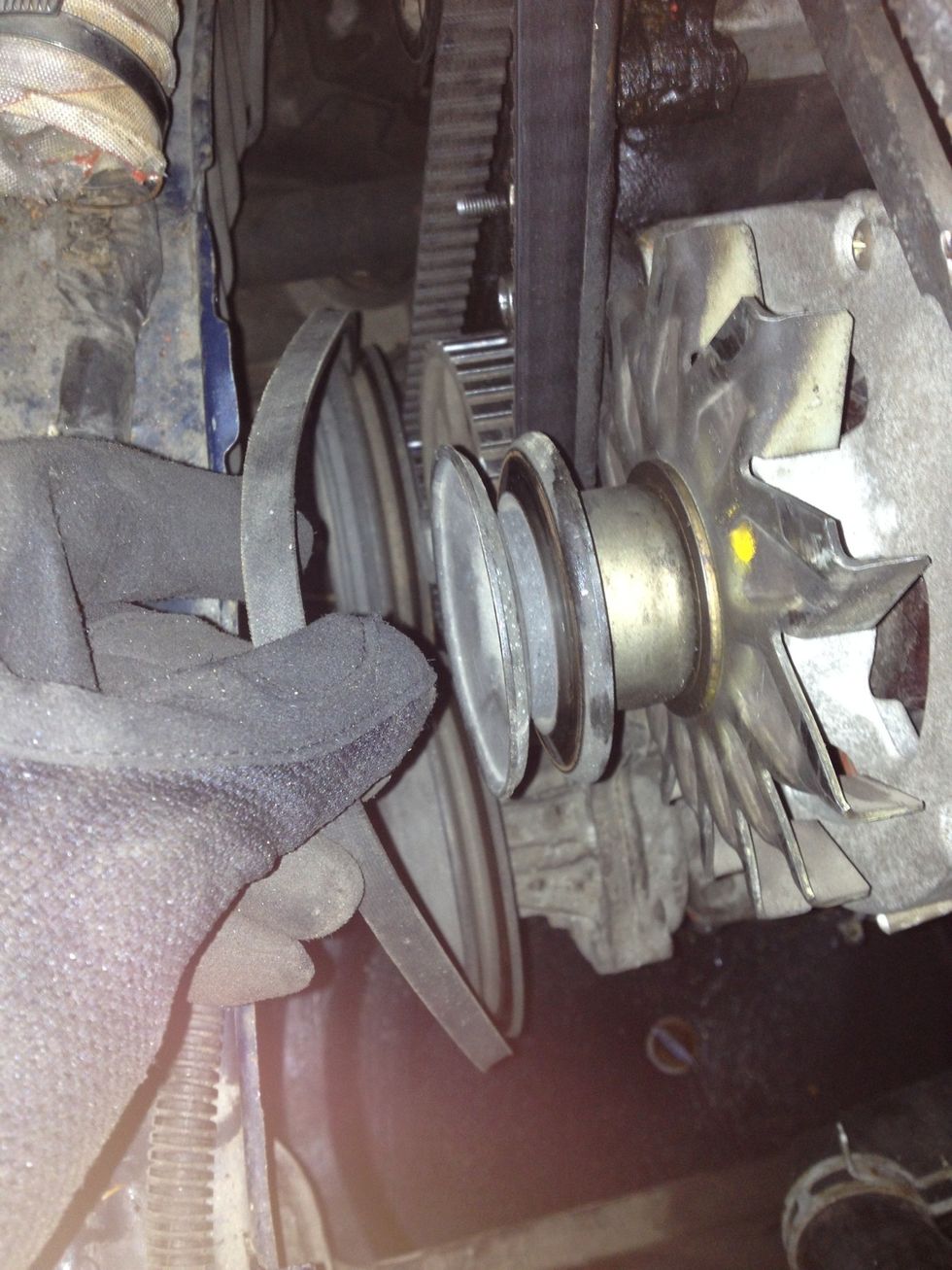 Pull the belt from the alternator pulley