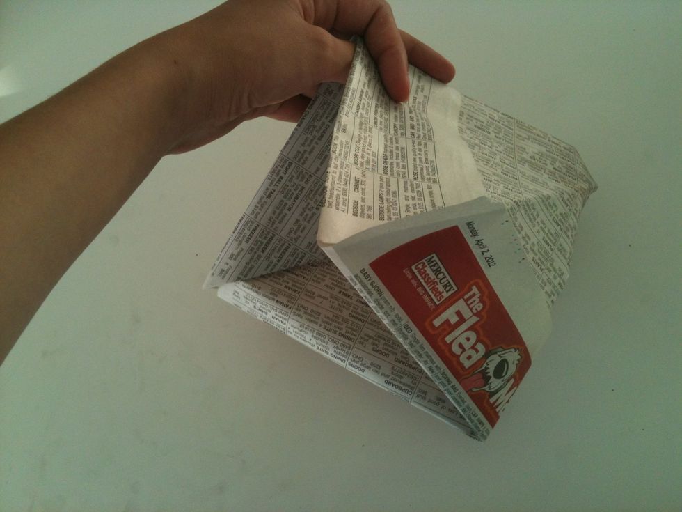 Pull the boat open and fold down the other way.