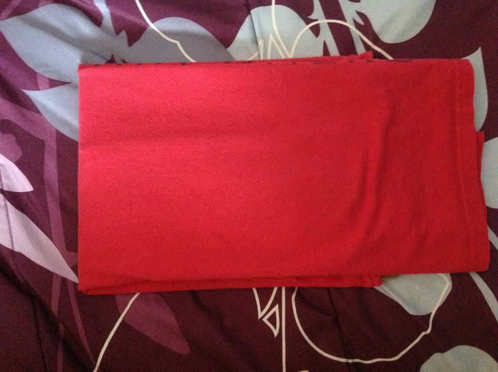 Pull the bottom of shirt all the way up until it reaches the clipboard