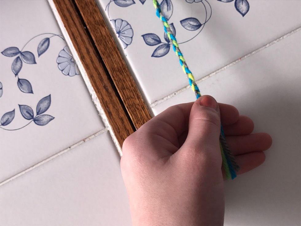 Pull the bottom of the braid