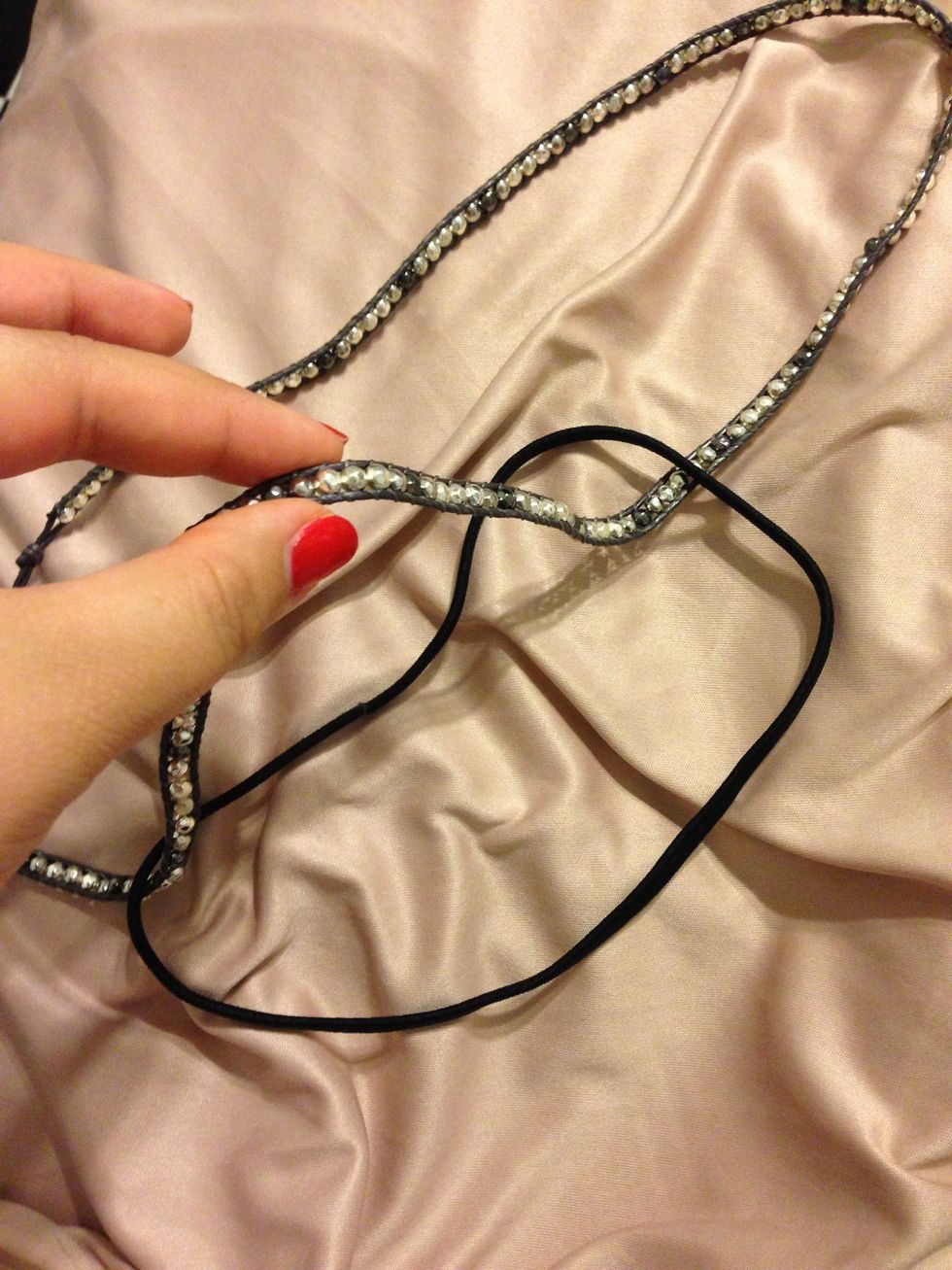 Pull the bracelet through.