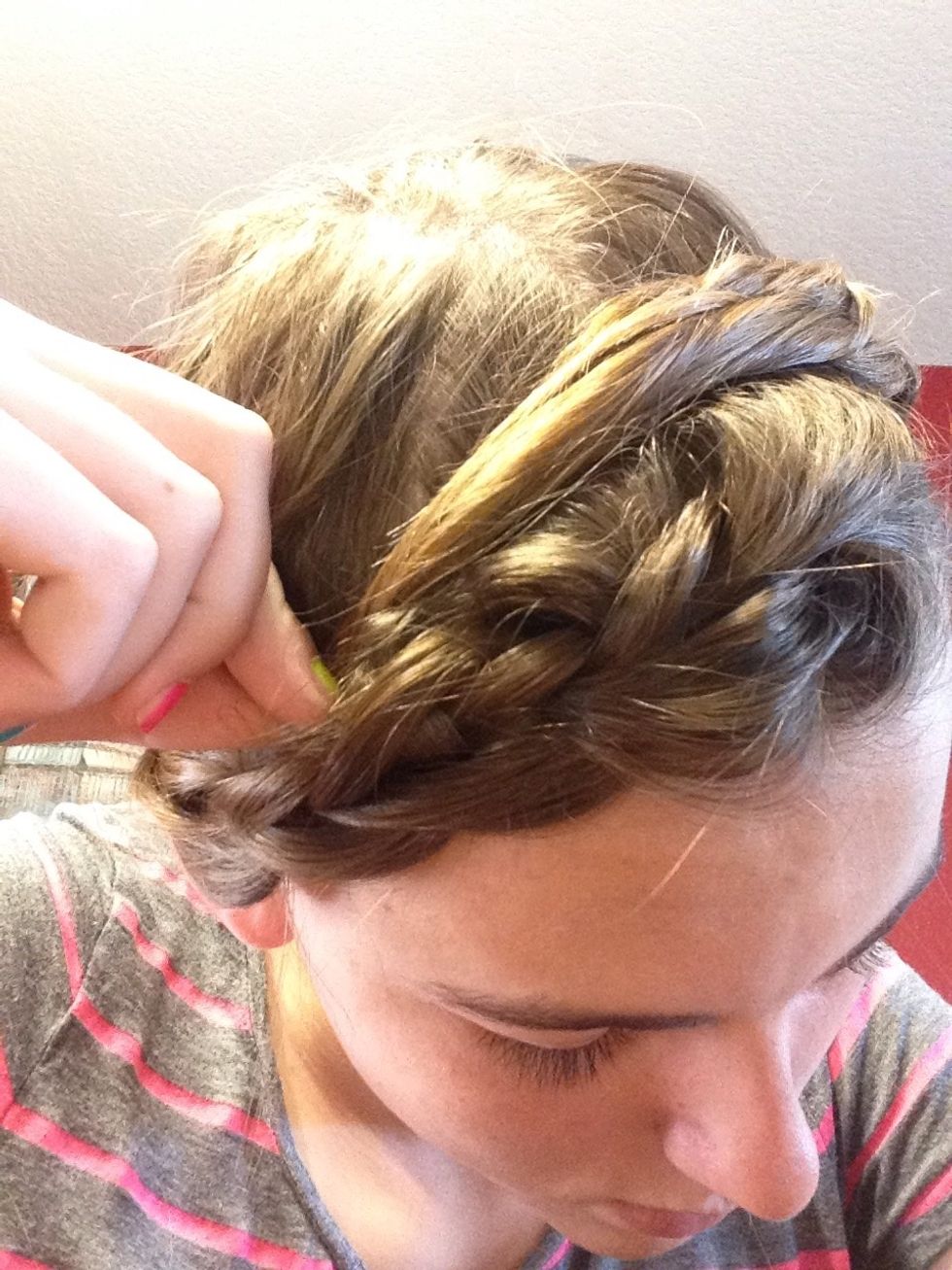 Pull the braid back up around your head and tuck in. Add a bobby pin or two.