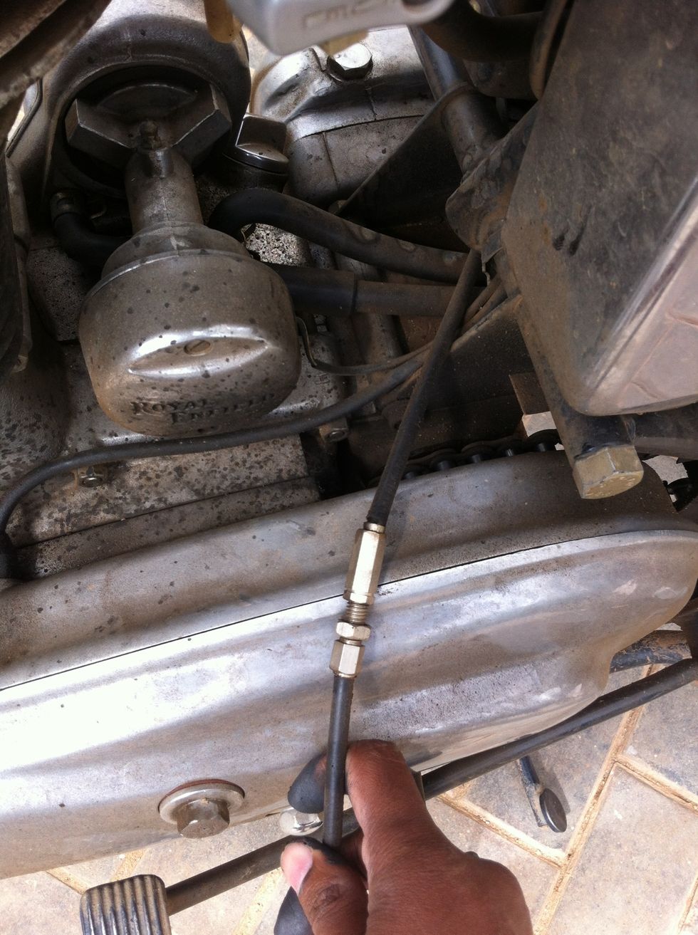 Pull the cable from behind the gear box