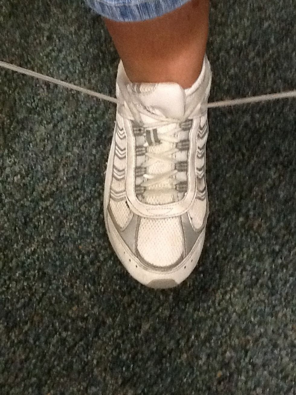 Pull the end of the laces tight.