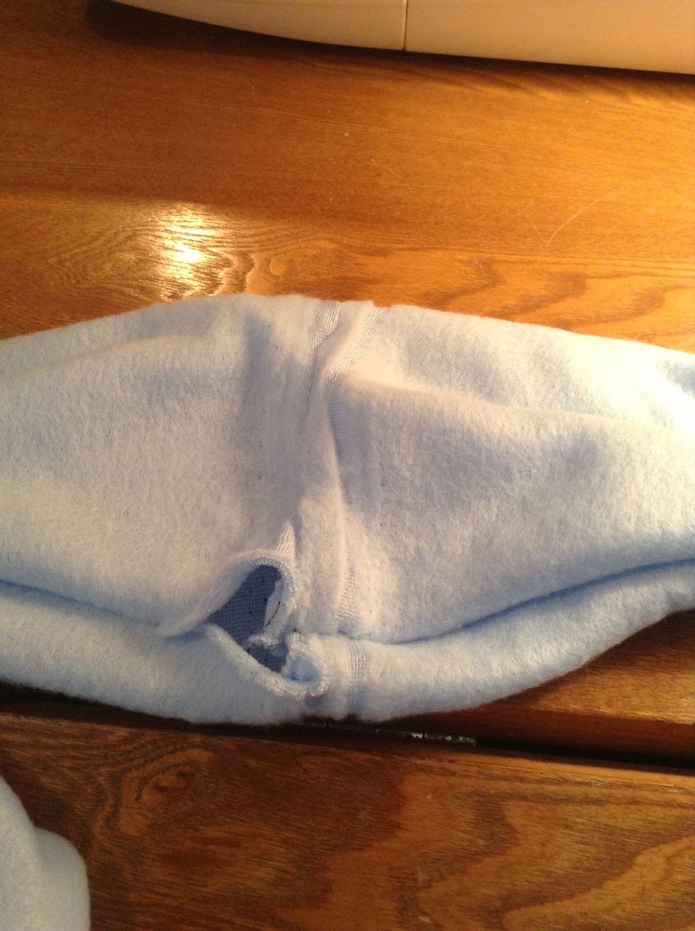 Pull the fabric apart so that it ends like this.