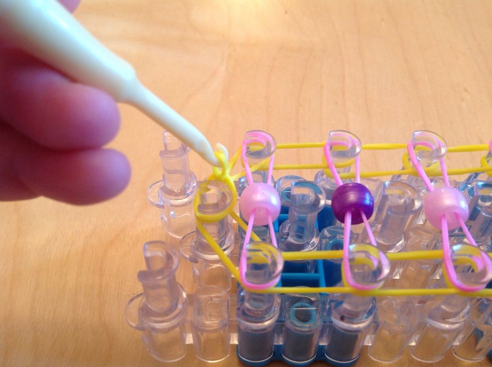 Pull the first band up.