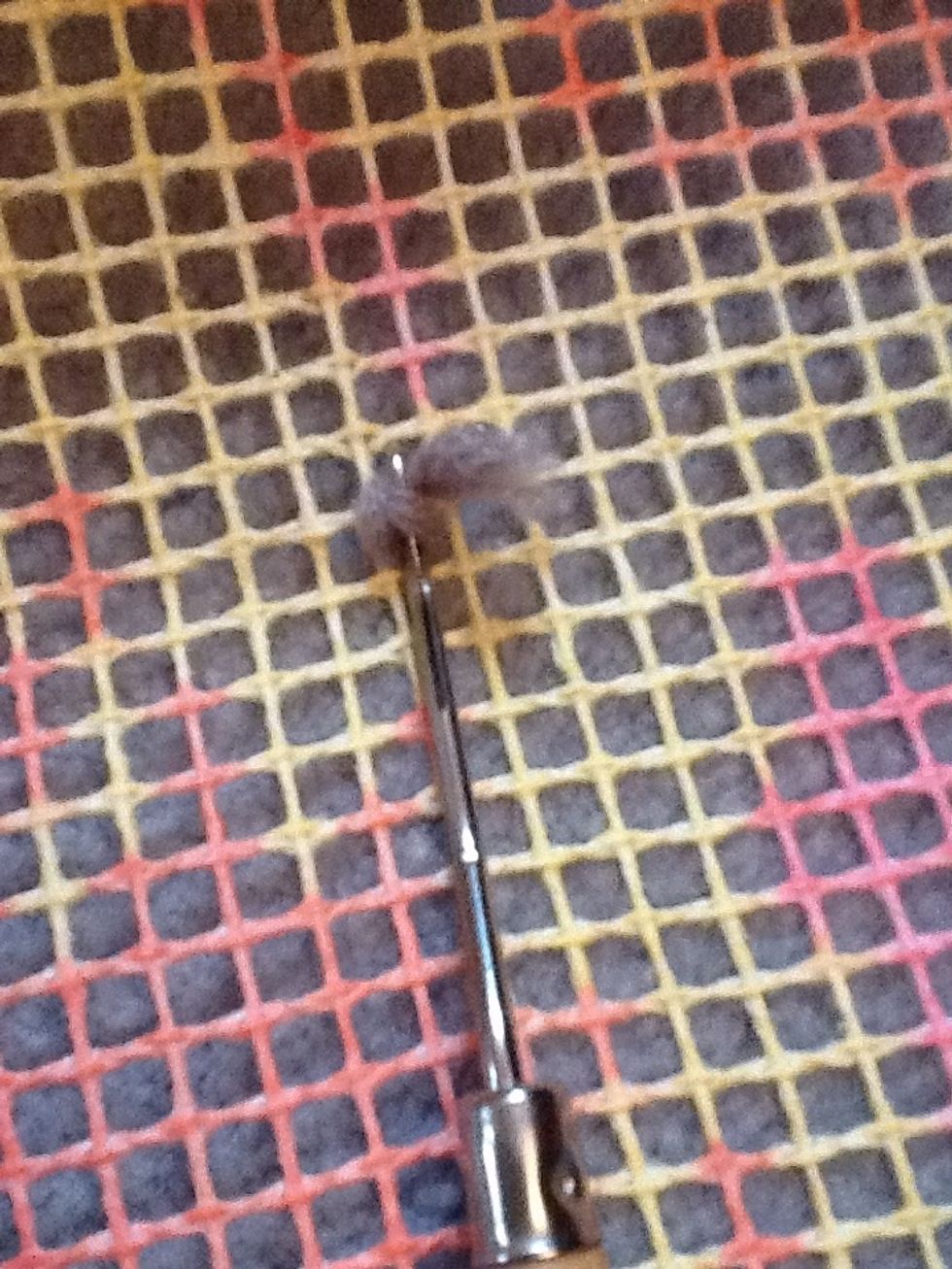 Pull the hook by the handle making sure nothing comes undone. The top will close and bring the yarn into a knot if you have done it right.