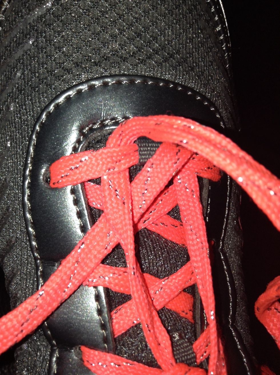 Pull the lace under itself