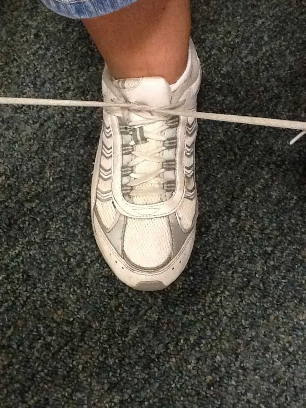 Pull the laces tight again.