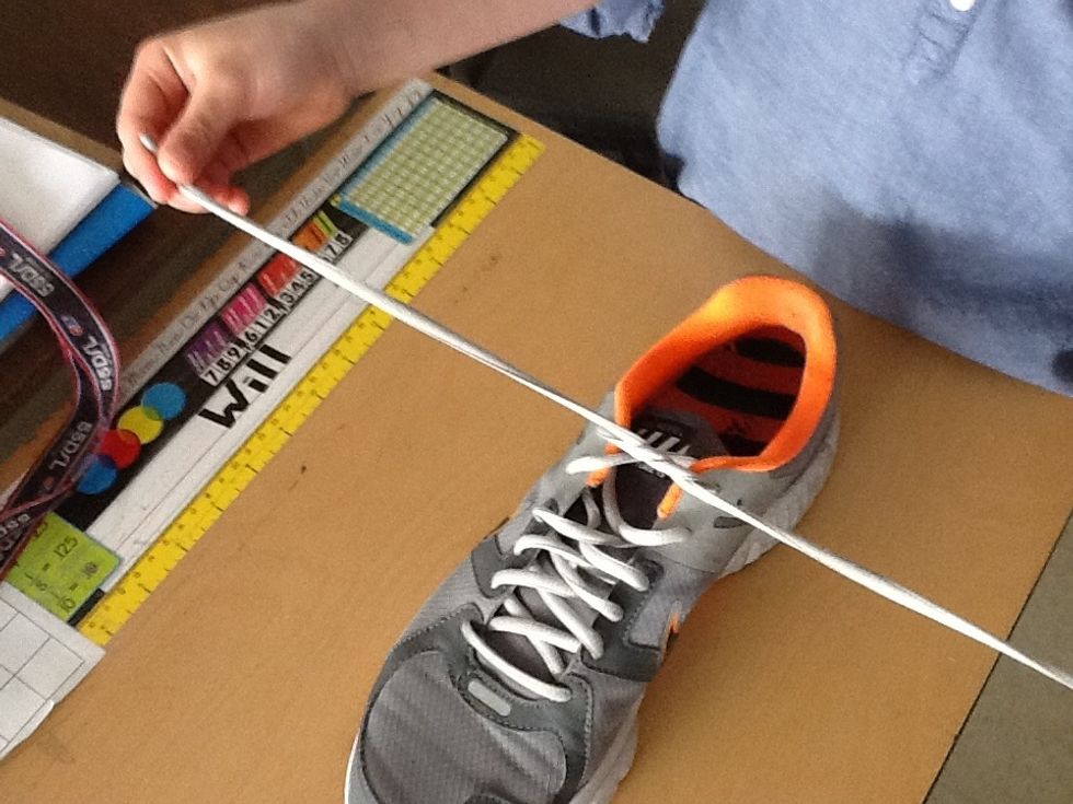 Pull the laces tight.