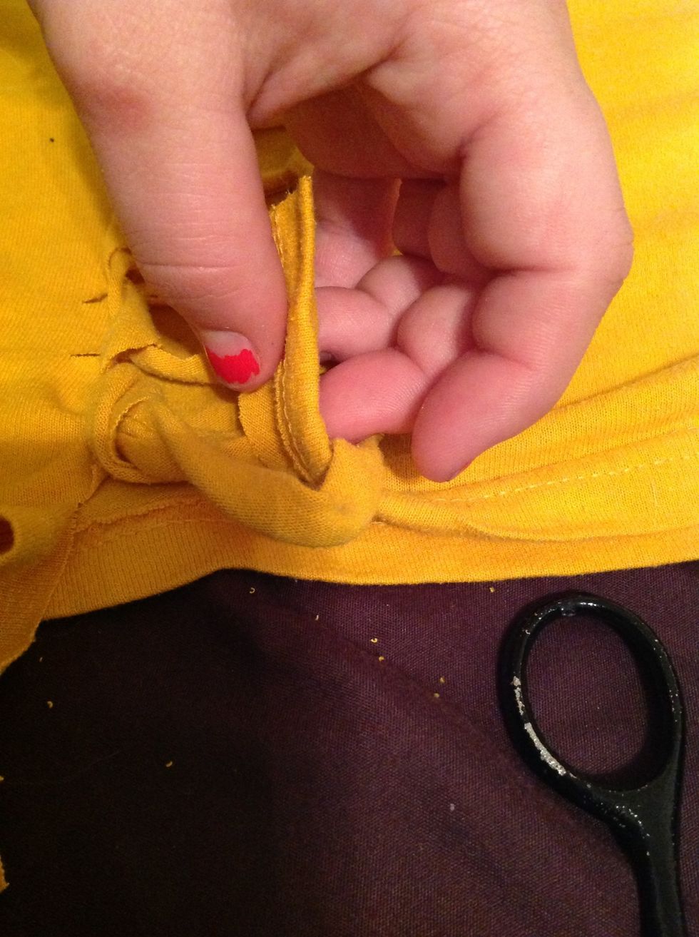 Pull the last one (the cut piece) through the bottom