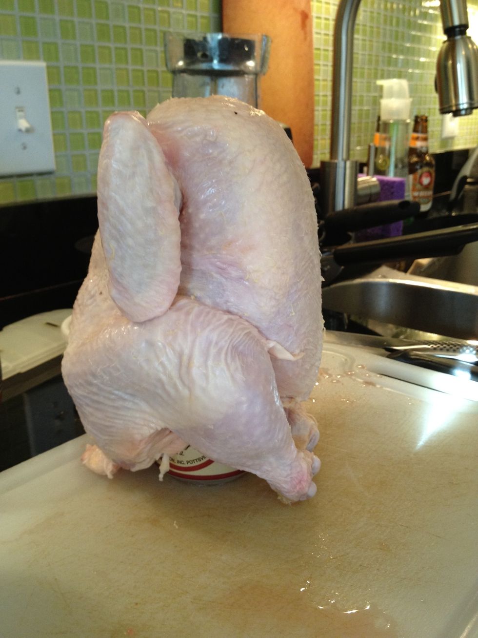 pull the legs forward like a tripod to help it stand.