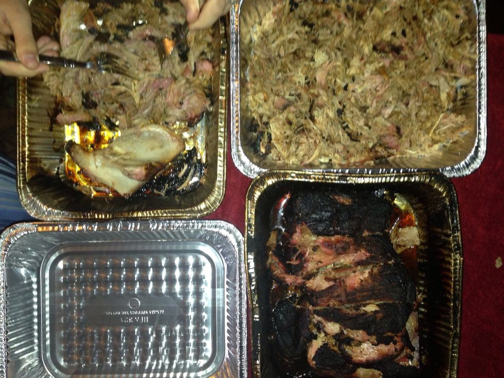 Pull the meat apart using forks or bear claws if you have them. If you cooked to 200+, the meat will pull very easily and nothing will be left on the bone. Add your favorite BBQ sauce but not much!