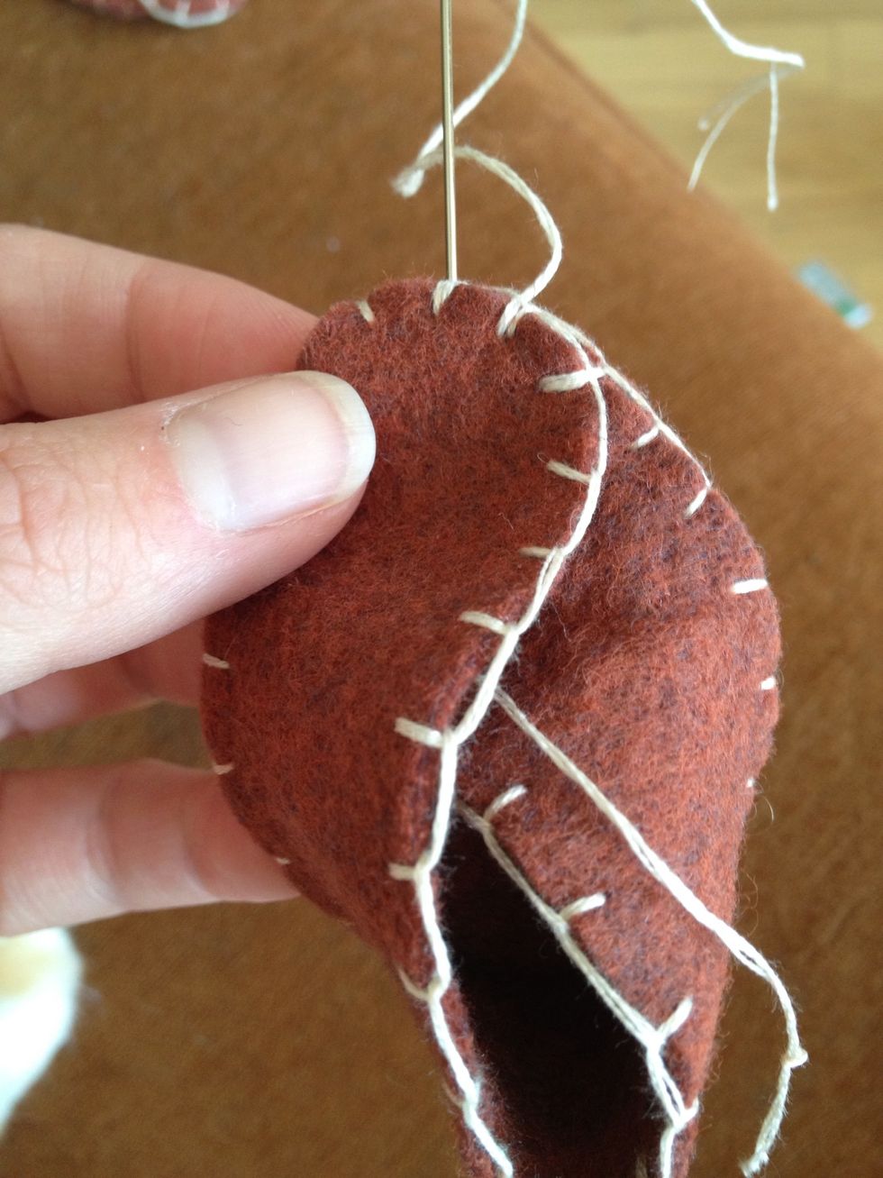 Pull the outside thread to the inside.