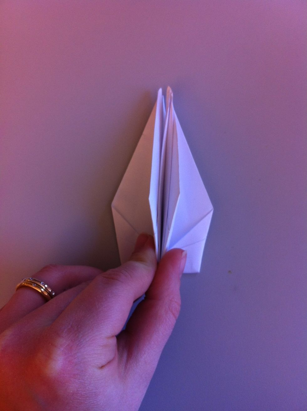 Pull the sides together and repeat on other side.