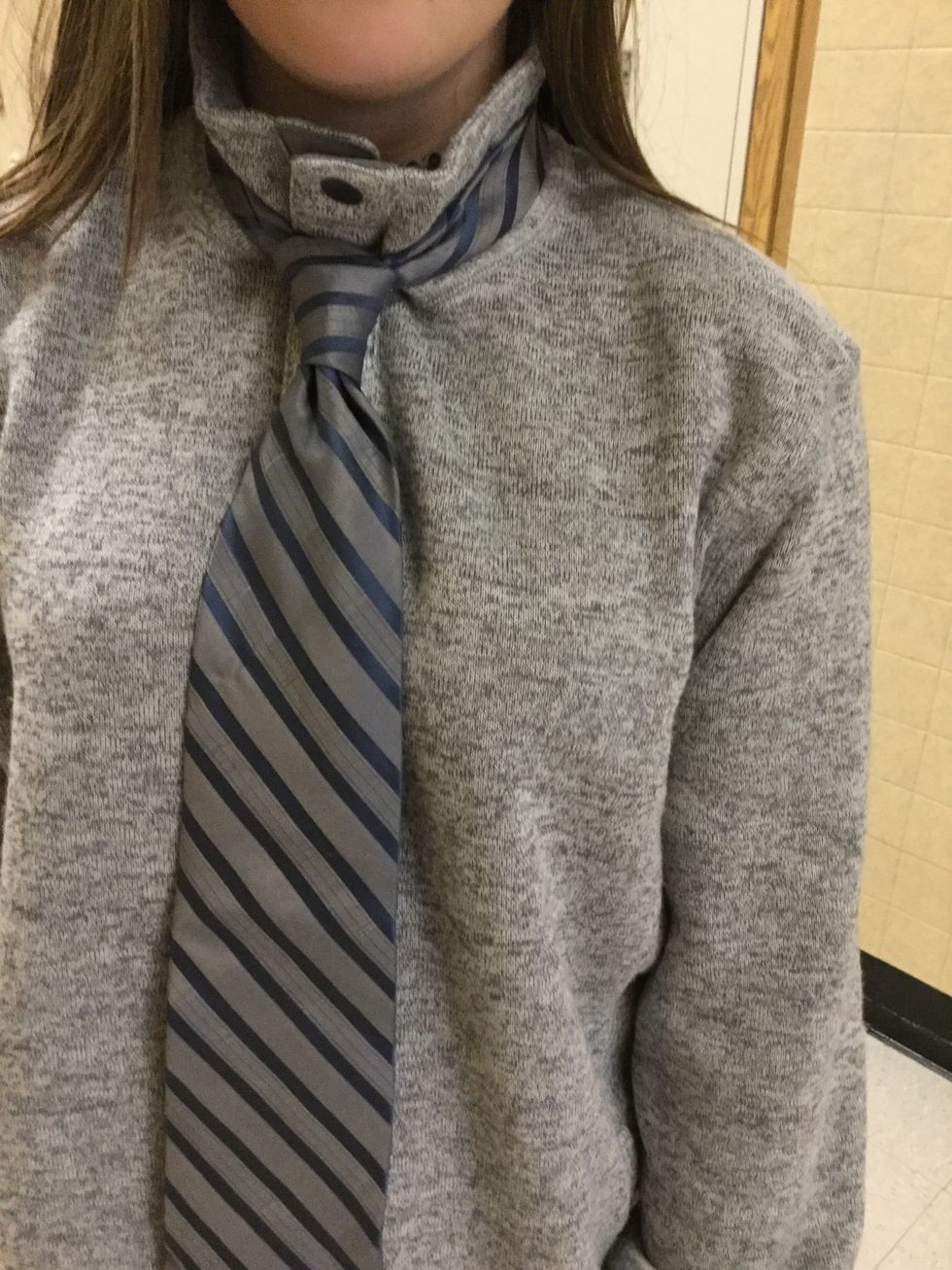 Pull the skinny side so the tie is snug on your next. Disclaimer* please don't choke your self.