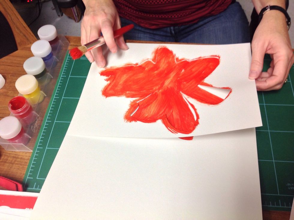 Pull the stencil off carefully and set on a scrap piece of paper.