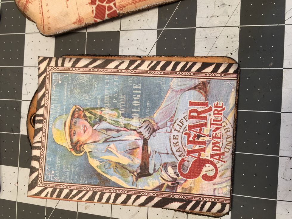 Pull the tape backing off and attach to the front side of the tag using the flap to cover the magnets. Line up the cut apart or attach at a slight angle if desired.