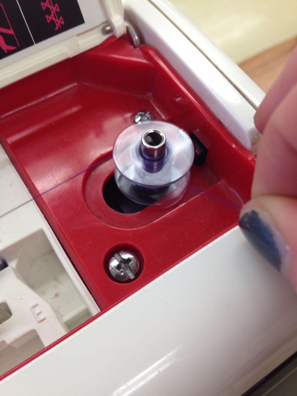 Pull the thread taut.