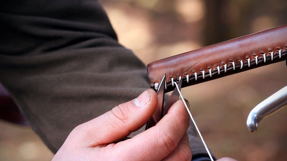 ...pull the thread through and cut it.