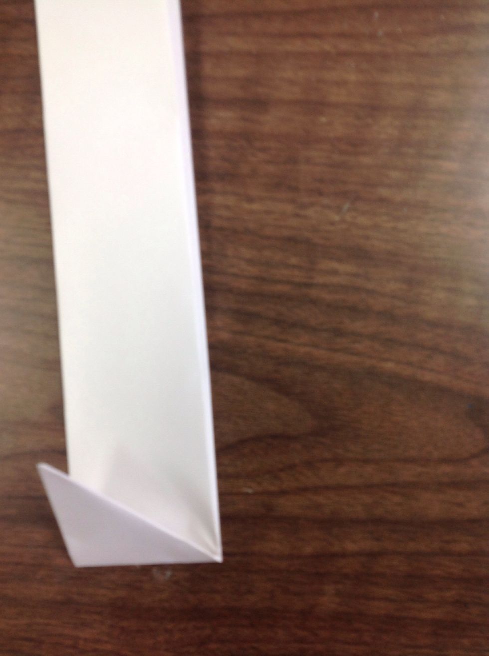 Pull the tip of the triangle up
