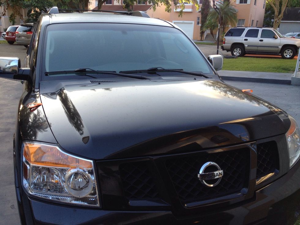 Pull them over the fender and close the hood, you can tuck them under when you're not using them