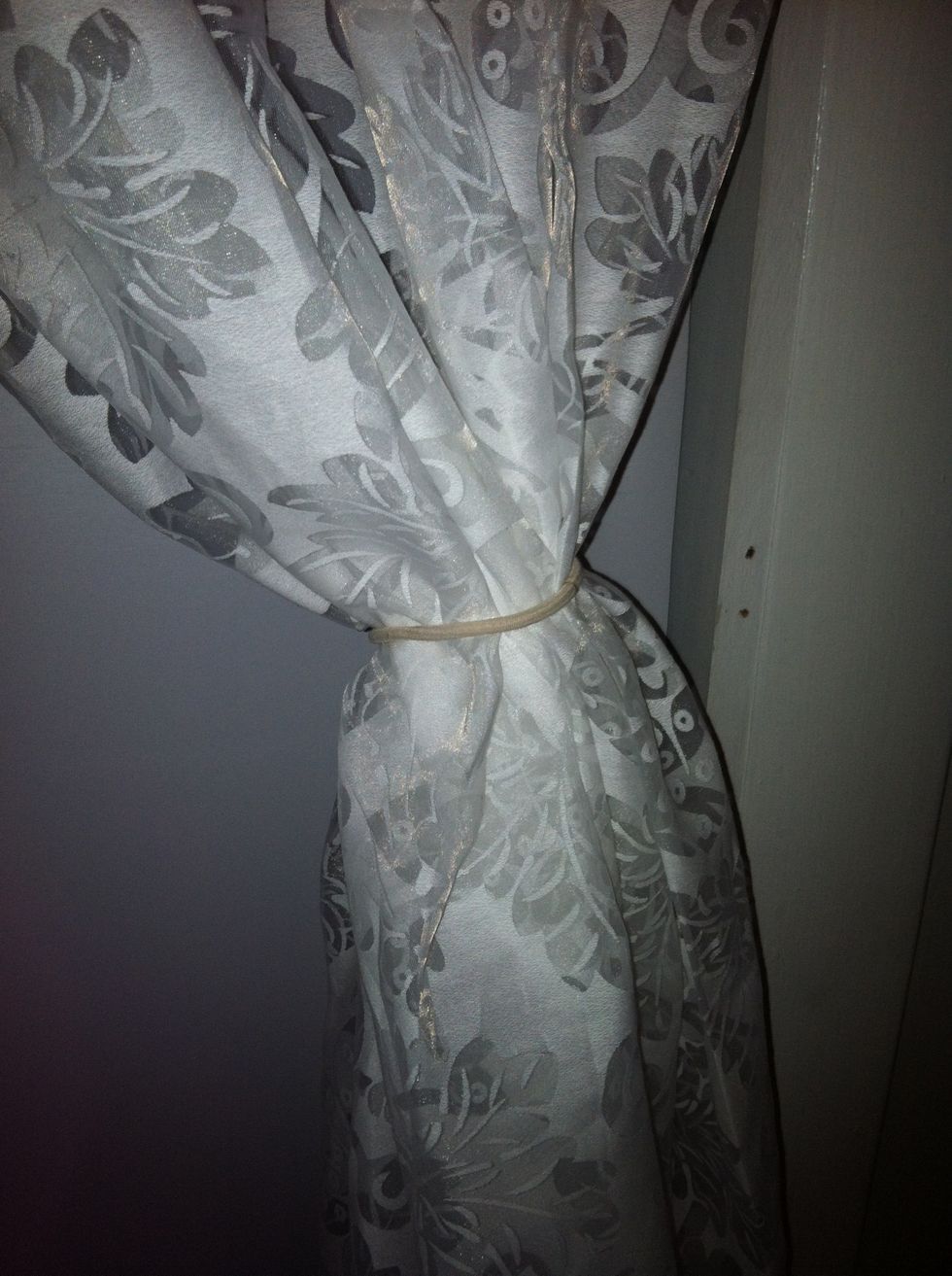 Pull them through a hair elastic (I chose cream because it matches the curtains )