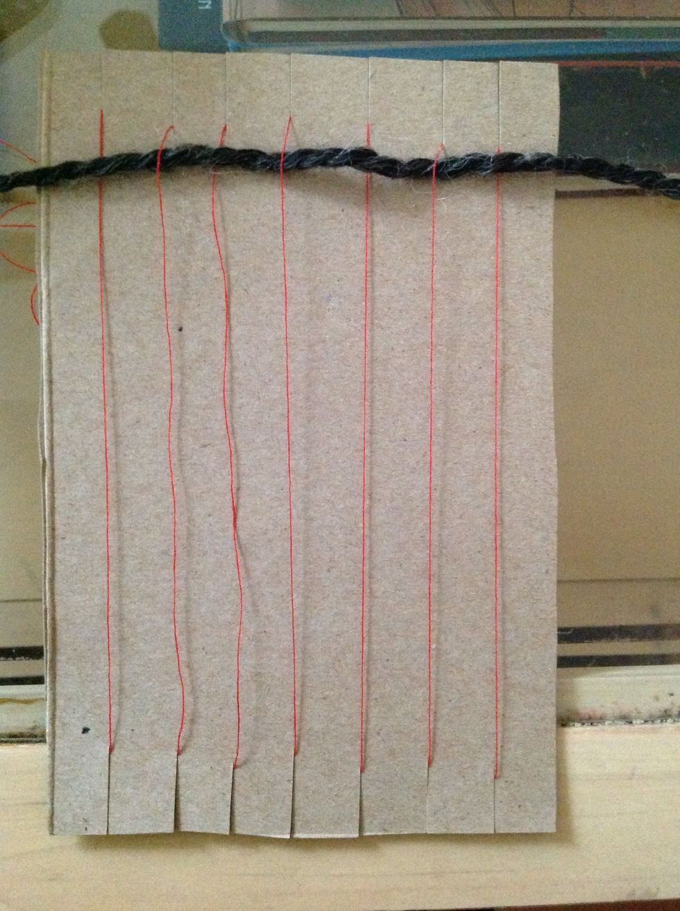 Pull through leaving an inch of yarn hanging off the edge