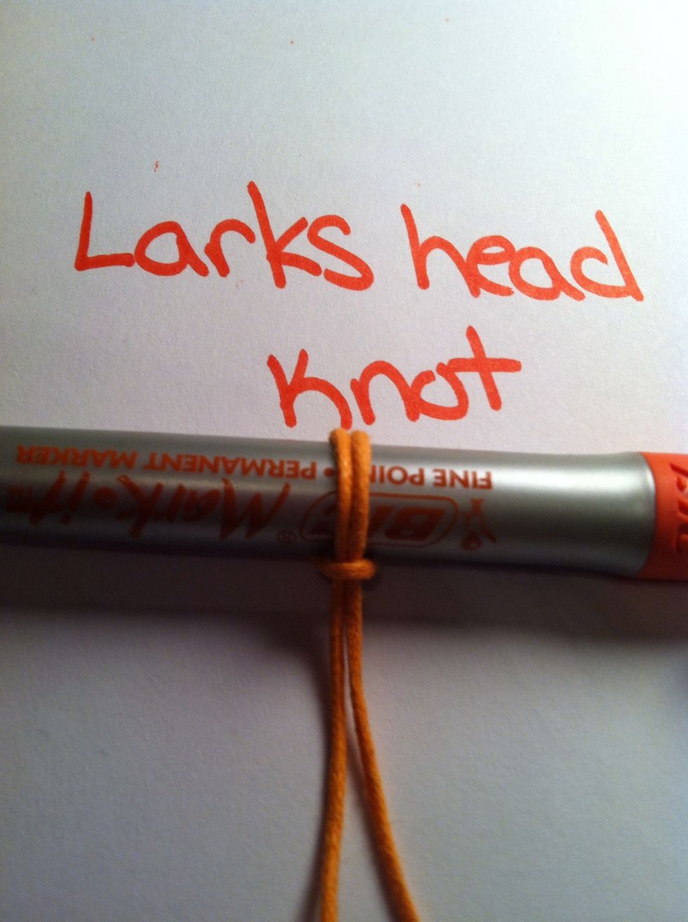 Pull tight and arrange to your preference. I usually prefer this side.