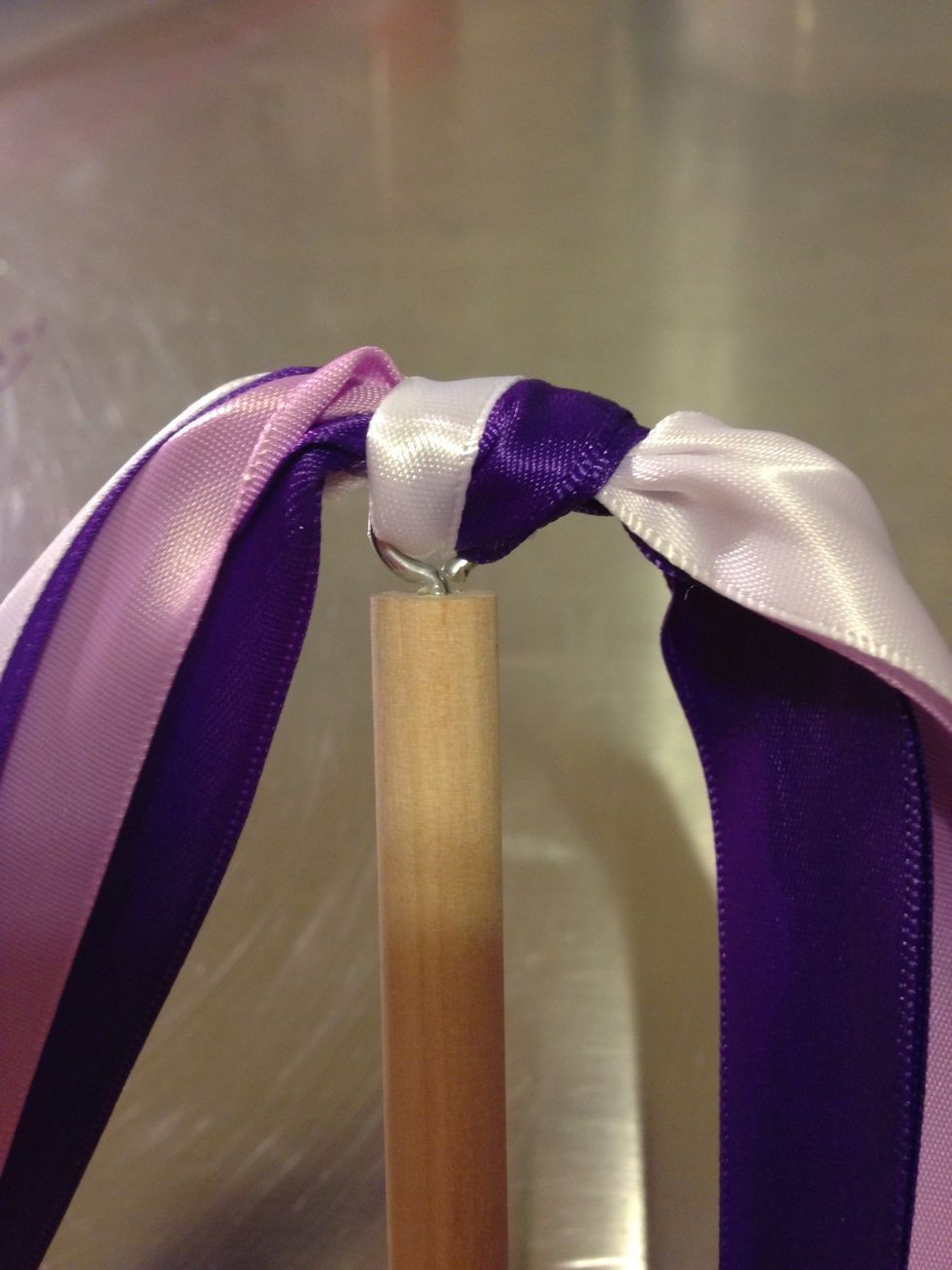 Pull tight and let hot glue set a few seconds before your princess waves her special wand.