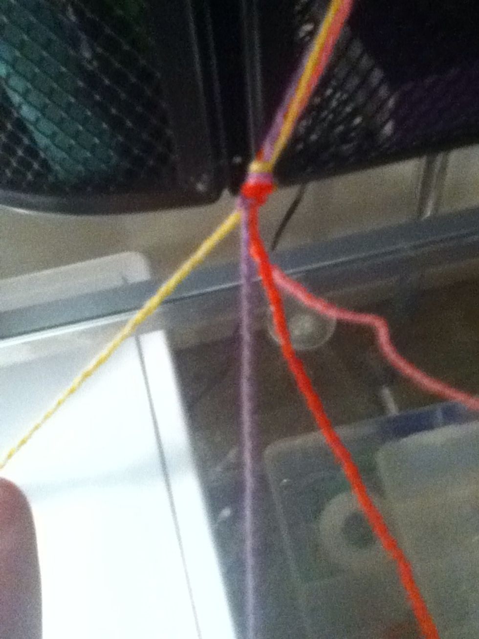 Pull tight. Repeat (this is necessary. If you don't repeat, your bracelet will twist).