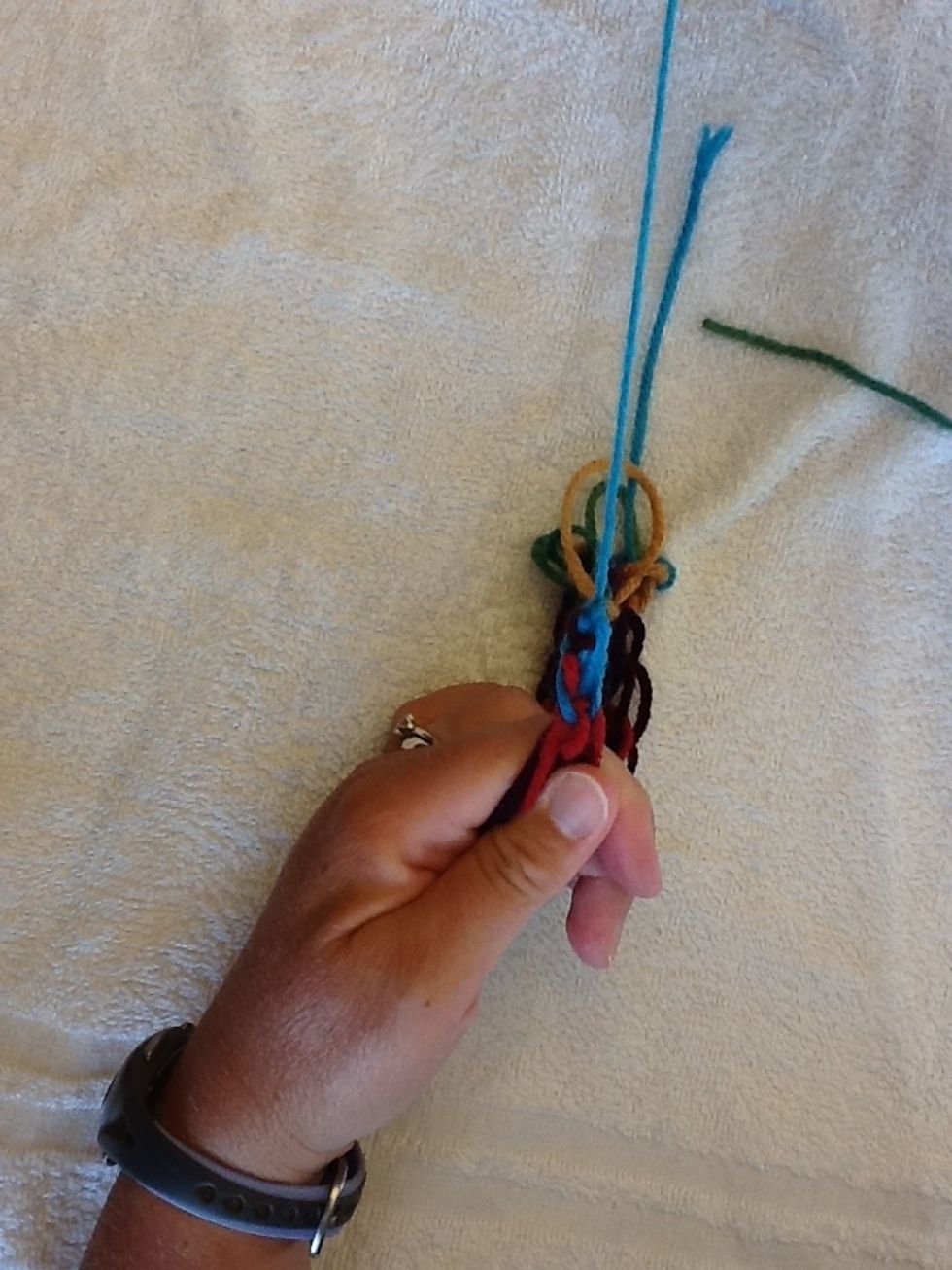 Pull tight. Yarn should tighten into a knot.