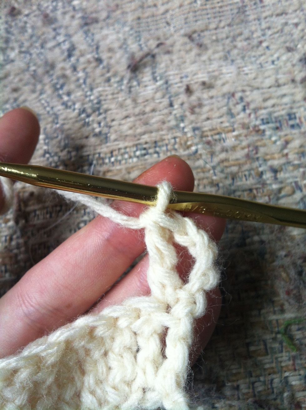pull trough your last 2 loops and you finished the first treble crochet of your second row!! :)