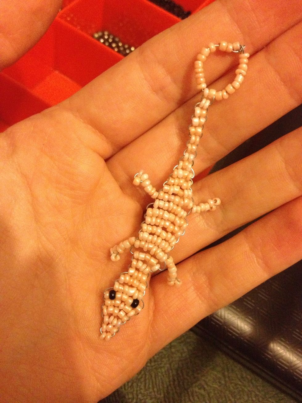 Pull twist and secure as best you can and there you have it :) wire lizard ! Just attach to your key ring :)