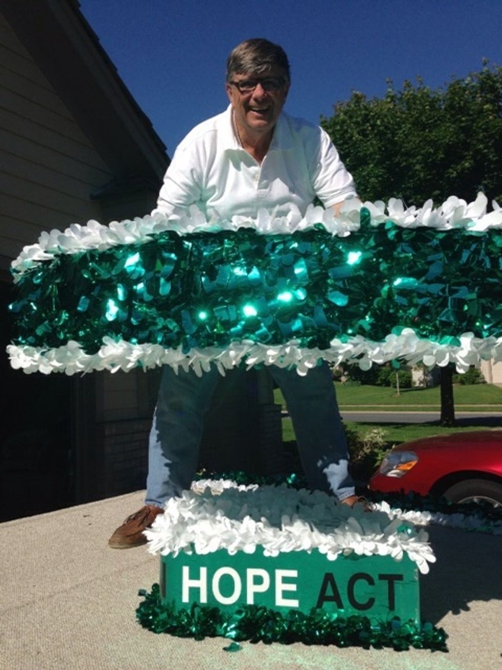 Pull up and hold the ribbon upright, and then...